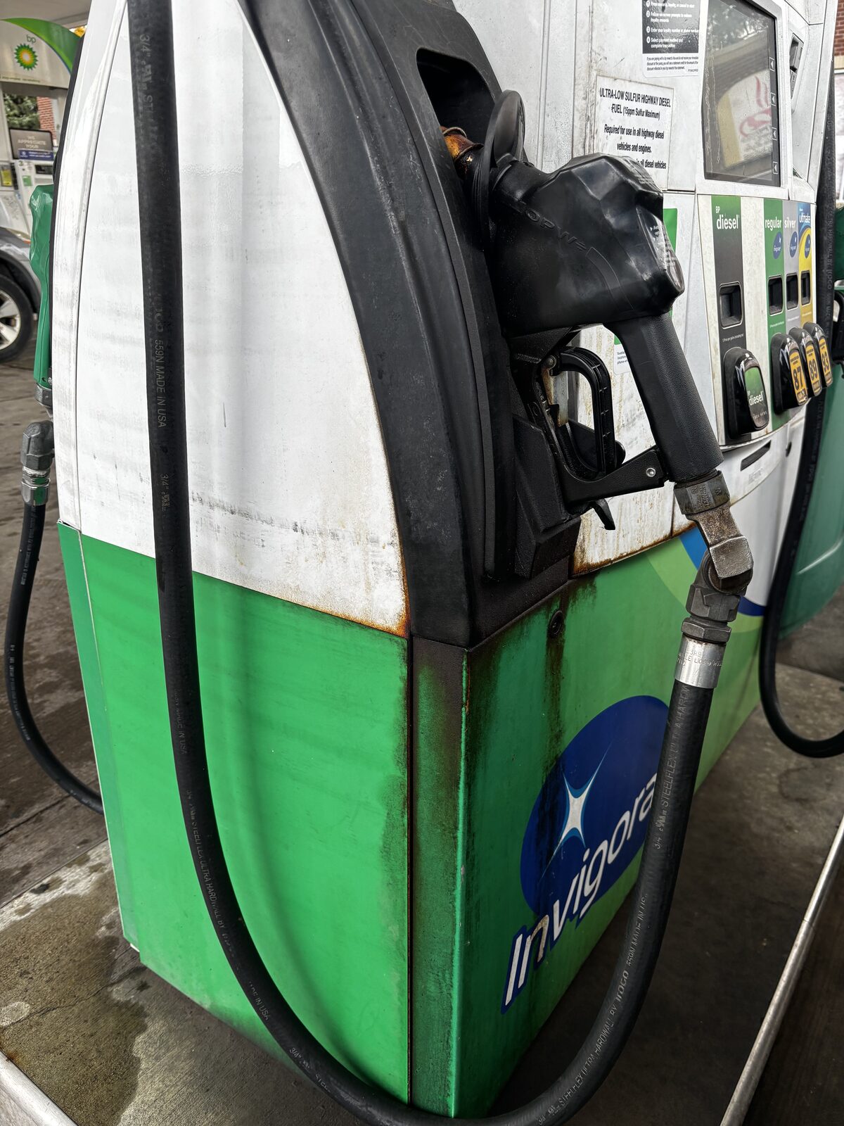 BP Invigorate dispenser — before FuelMark cleaning